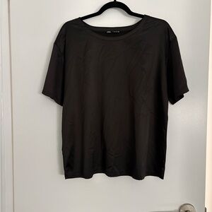 Black silky short sleeved shirt